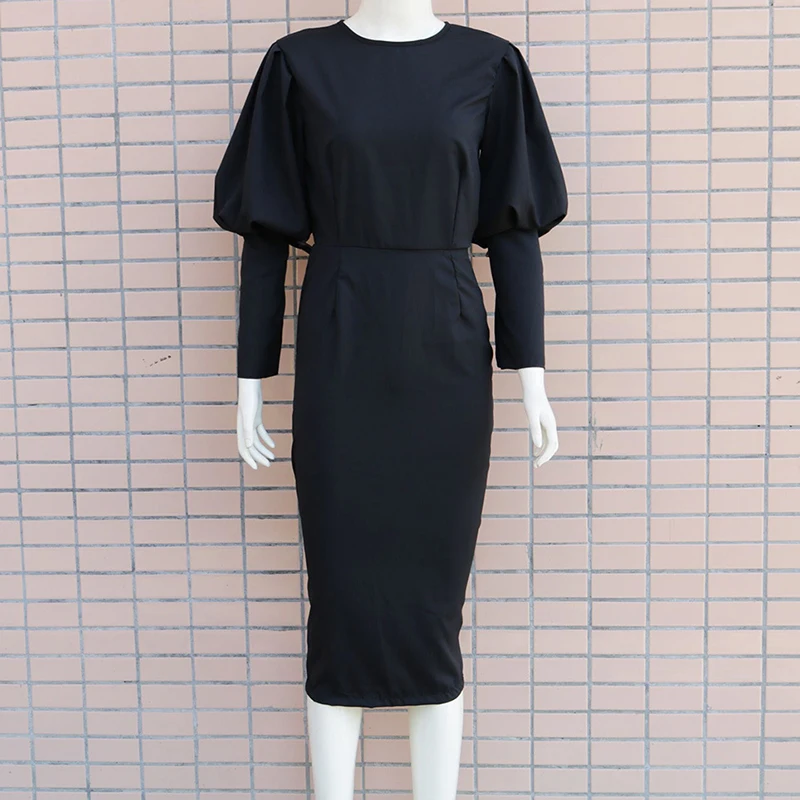 Однотонное платье с пышными рукавами открытой спиной и разрезом женское длинным