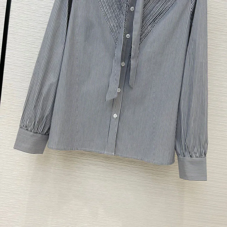 

2021 Early spring women's new temperament literary commuter simplicity department leads long-sleeved striped shirt