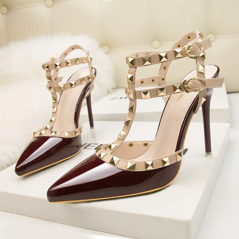 

10CM European sexy nightclub heels patent-leather metallic rivets sexy nightclub single shoes gladiator shoes 2021