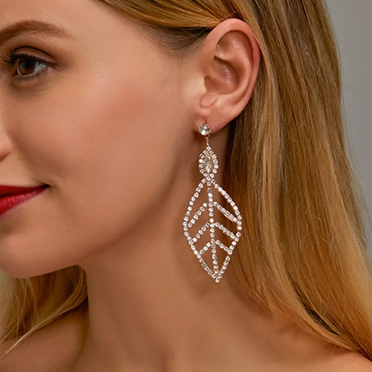 

Свадебные серьги в виде листьев дерева с кристаллами циркониевые полые серьги в форме листьев для женщин серьги Свадебные ювелирные издели...