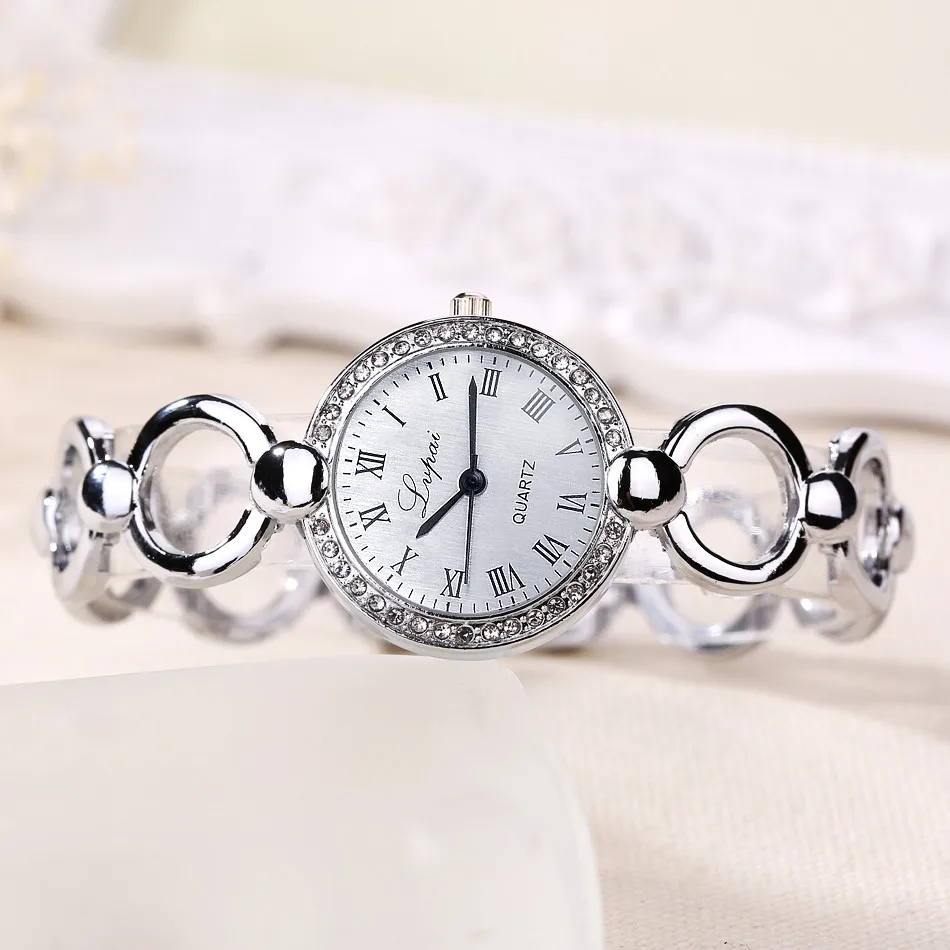 

Hot Selling Bright Silver Quartz Wristwatches Woman Fashion Stainless Steel Hollow Strap Women's Watches Luxury Women Watches