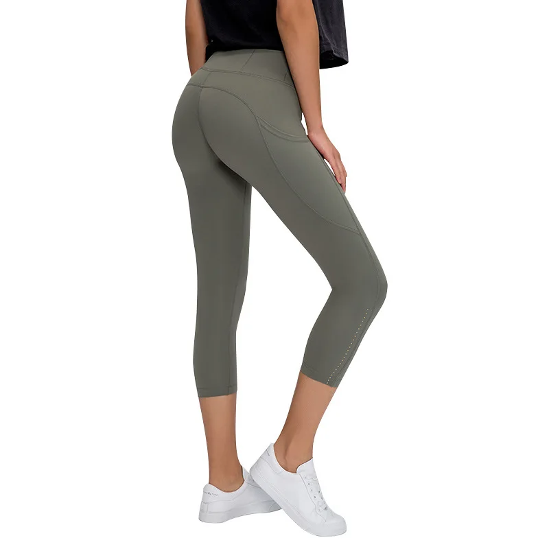 

Skin-friendly nude high waist buttocks stitching side pockets small sports cropped pants leggings sport women fitness