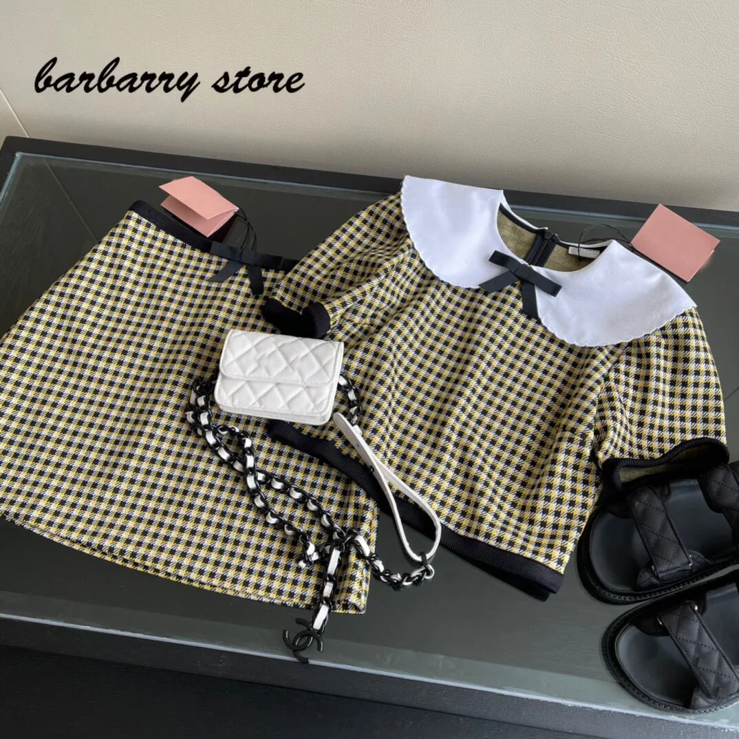 

2021 luxury brand retro stripe fashion women's skirt set sexy temperament petal collar Short Sleeve Top + high waist slim skirt