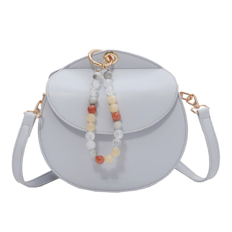 

Western style small female 2021 new han edition hand bag design bag joker ins semicircle his saddle bags