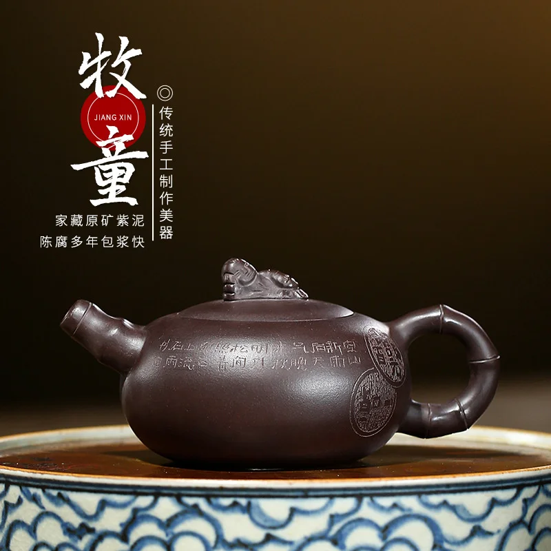

Yixing new purple clay pot raw ore Purple mud paste bamboo leaf hand carved Teapot Tea Set Gift