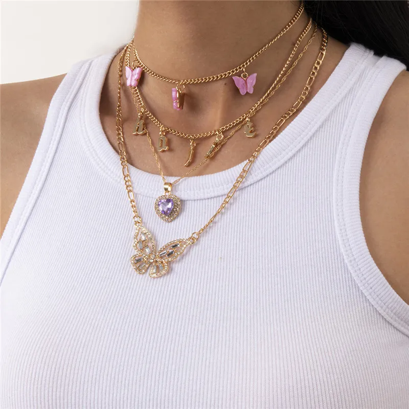 

Temperament Multi-element Peach heart Necklace FEmale Retro diamond-Studded butterfly Letter necklace set