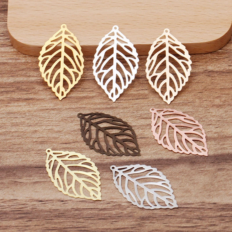 

50pcs 35x20mm Hollow Copper Leaf Charms Pendants Jewelry Vintage Bracelet Necklace Pendant Charms Material Jewelry Findings DIY