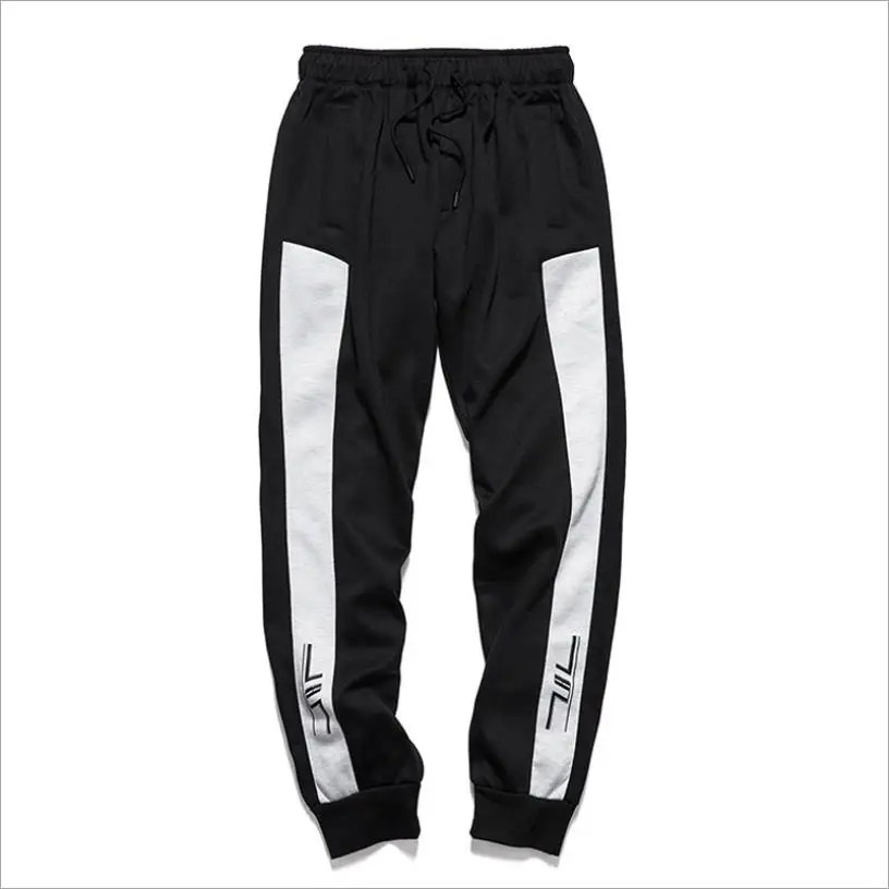 

Autumn and winter man casual elastic track trousers printed side beading male casual pants man beam feet drawers