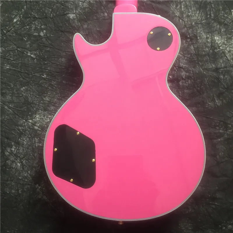 

High-quality electric guitar, pink, top quality, P90 pickups.