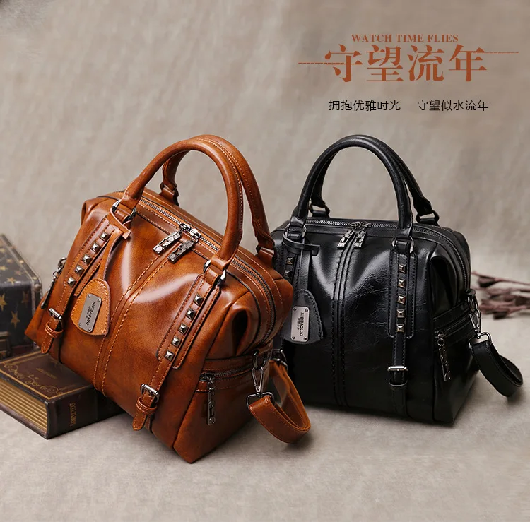 

Large capacity women's one-shoulder big bag new retro rivet handbag solid color multi-compartment messenger fashion female bag