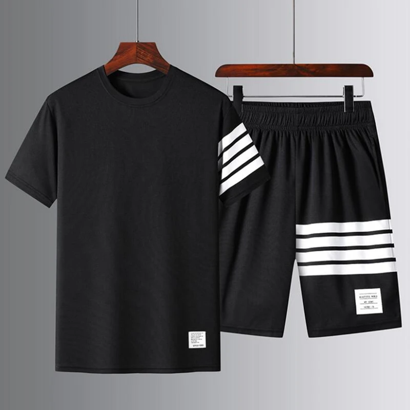 Костюм спортивный мужской из 2 предметов быстросохнущий с коротким рукавом |