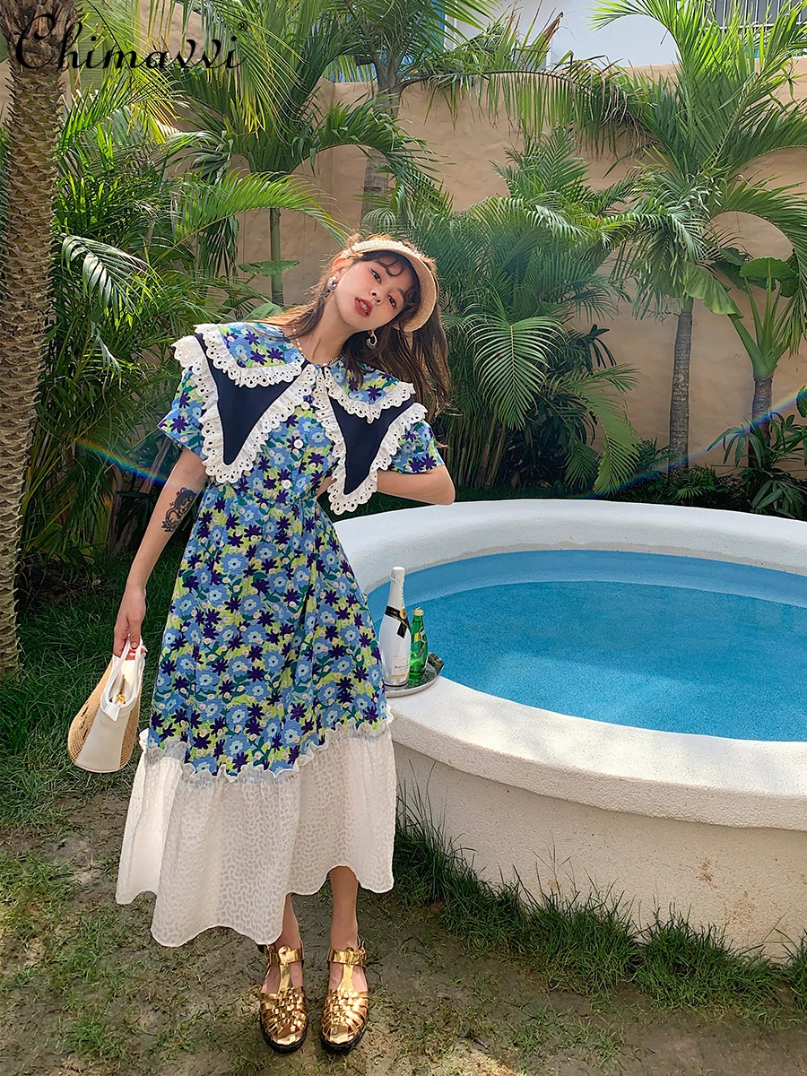 

Over Knee Floral Long Dress 2021 Summer Loose Short Sleeve Loose Waist Dress Female Korean Single Breasted Vacation Dress