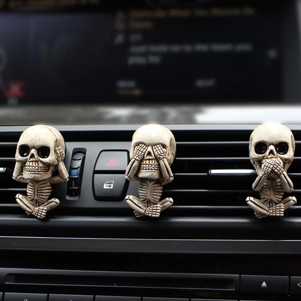 

Halloween Evil Skull Trio Statue Auto Vent Air Freshener Car Air Outlet Ornament Home Decor Decoration Accessories Room Dropship