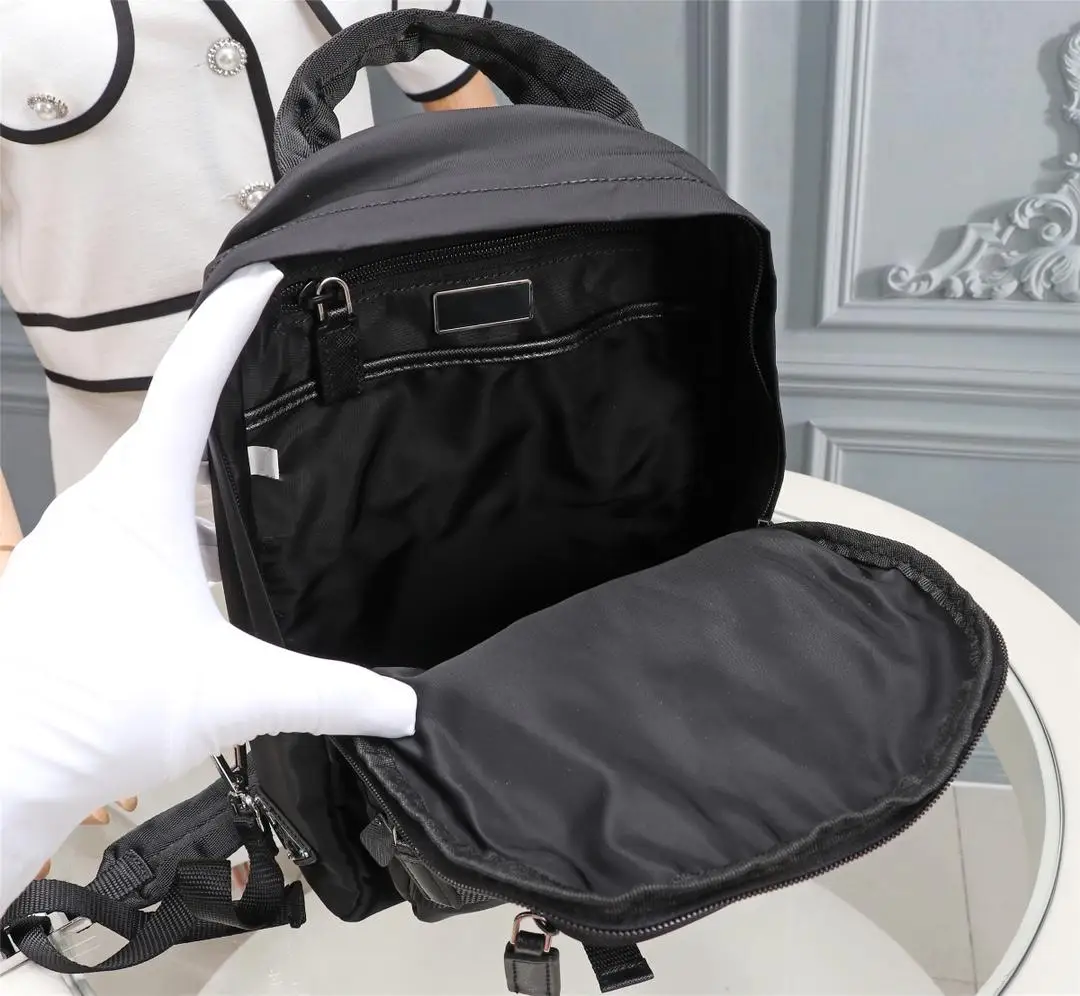 

Unisex nylon canvas waterproof backpack fashion leisure sports outdoor fitness rock mountaineering multifunctional travel bag