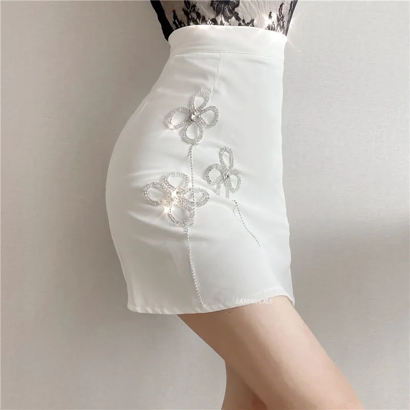 

2021 Summer New Exquisite Rhinestone Tassel High Waist Slim Mini Skirt A- Line Women Hip-Wrapped Solid Color Above Knee Skirt