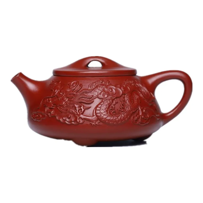 

Yixing purple clay pot raw ore Dahongpao Shuanglong stone ladle pot heap painting relief teapot boutique special price