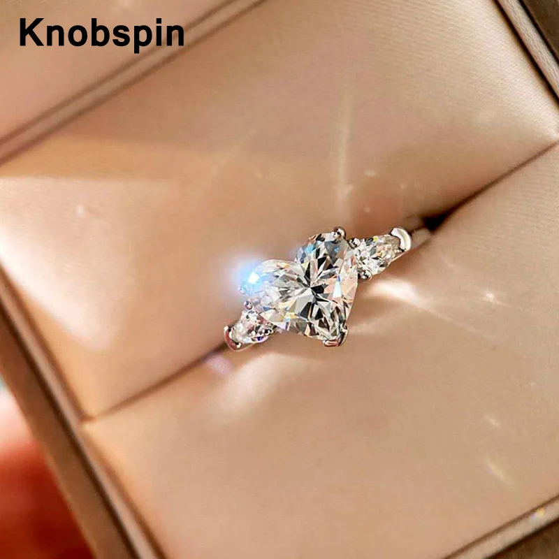 

Knobspin Роскошные 100% 925 стерлингового серебра 2 карат обручальные кольца с сердцем для женщин создать Муассанит вечерние хорошая бижутерия юве...