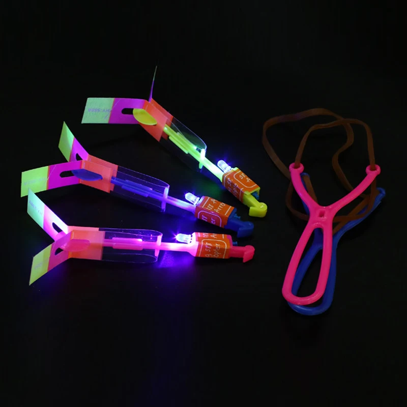 

10 Pcs Amazing LED Light Arrow Rocket Rotating Flying Toys Kids Outdoor Flashing Toy Fly Arrow ALS88
