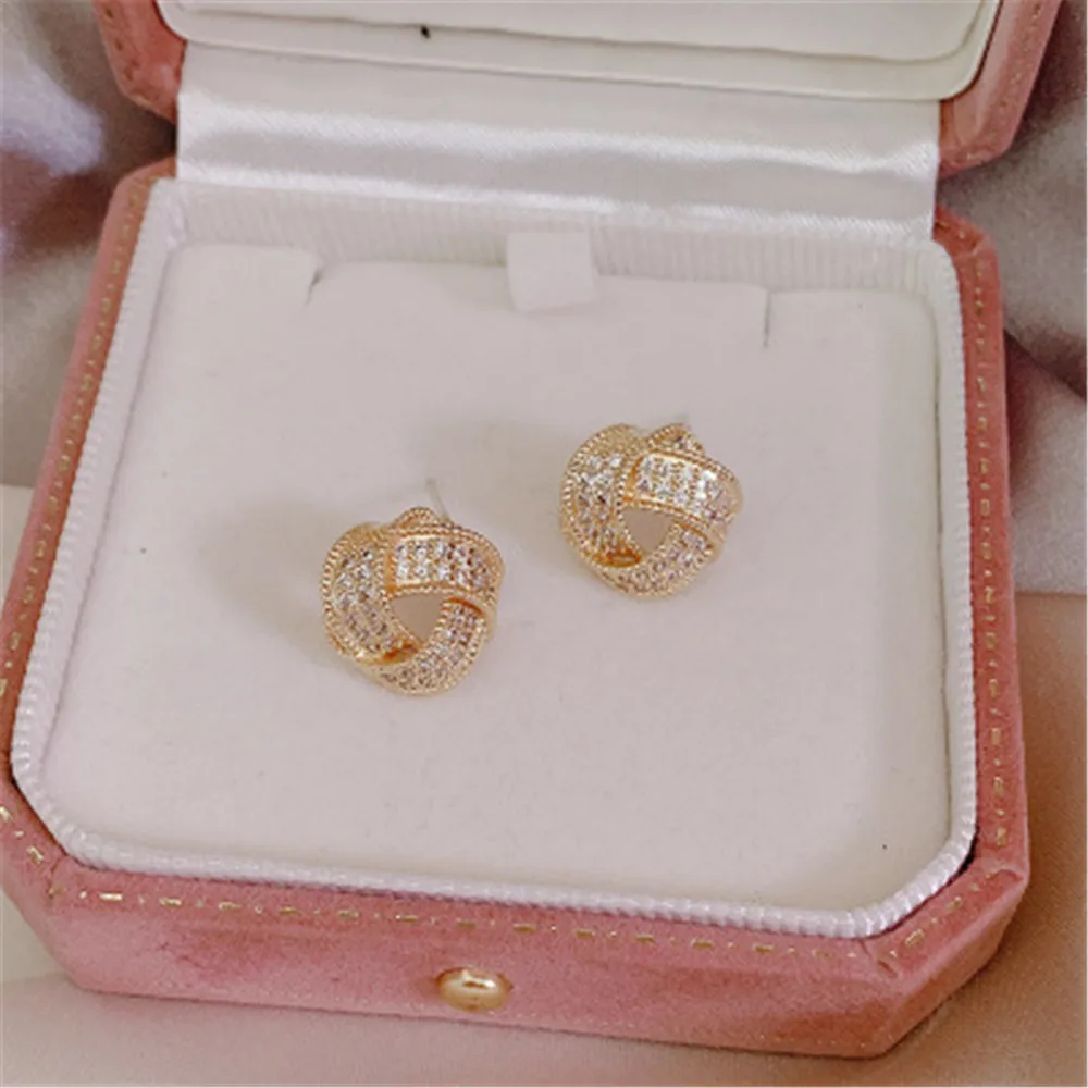 

LISM new personality copper inlaid full of zircon temperament wild twisted triangle ladies earrings fashion jewelry