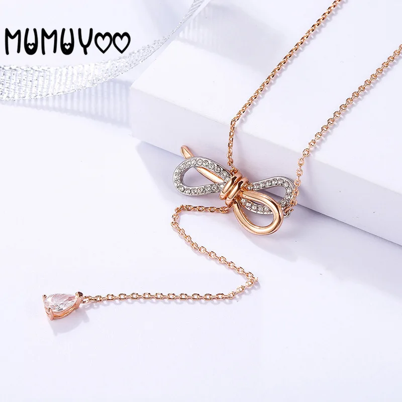 

Fashion jewelry high quality swa, charming and romantic bow two-color long sweater necklace female fashion jewelry