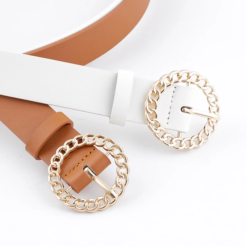 Женский кожаный ремень с ажурным уплотнительным кольцом круглой пряжкой