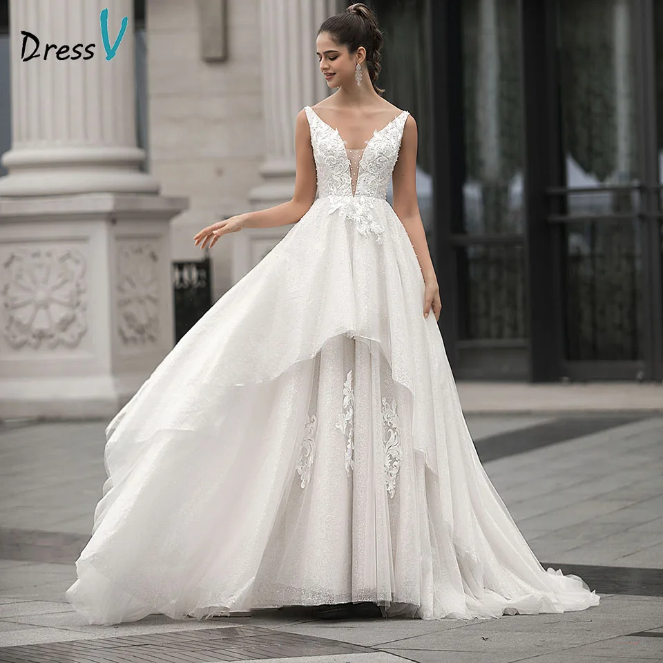 Свадебное платье цвета шампанского трапециевидной формы с аппликацией