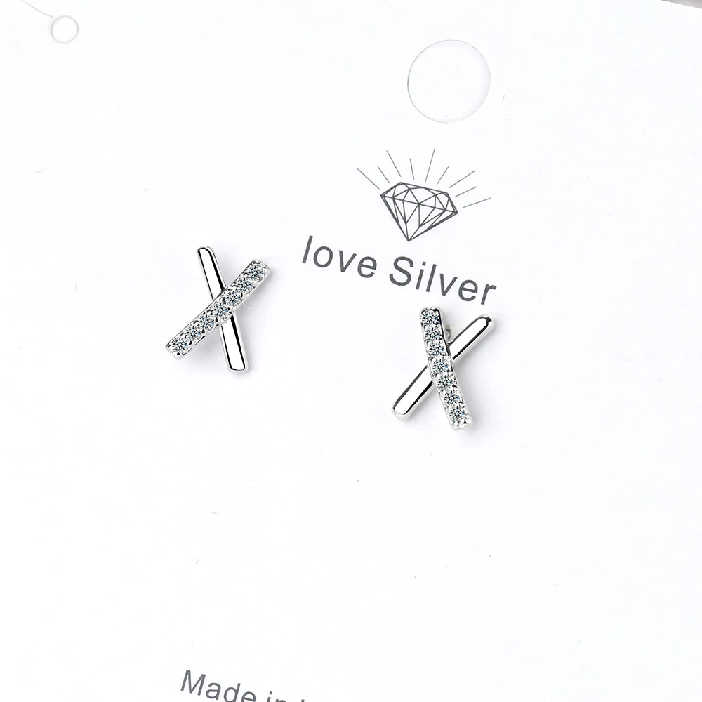 Простые серьги X-образной формы серебряного цвета с поворотным изгибом и крестом