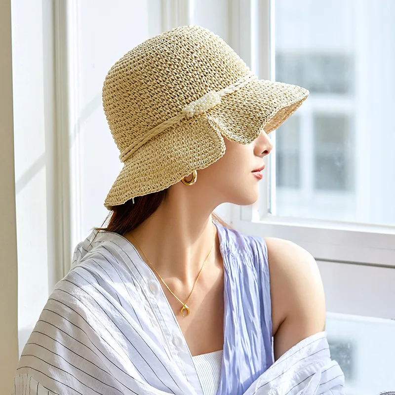 

Women's bucket hat summer pure color Korean Cap Japanese simple straw woven pearl dome Bucket hat foldable sunscreen bucket hat
