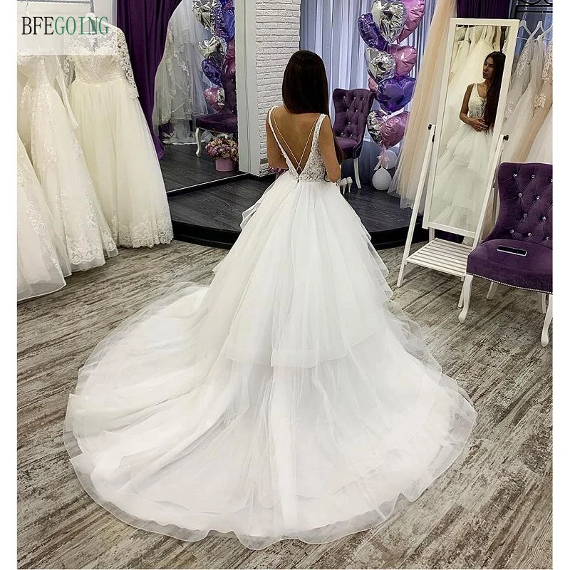 

White Tulle Lace V-Neck Sleeveless Floor-length A-line Wedding dress Chapel Train Bridal gown Custom made