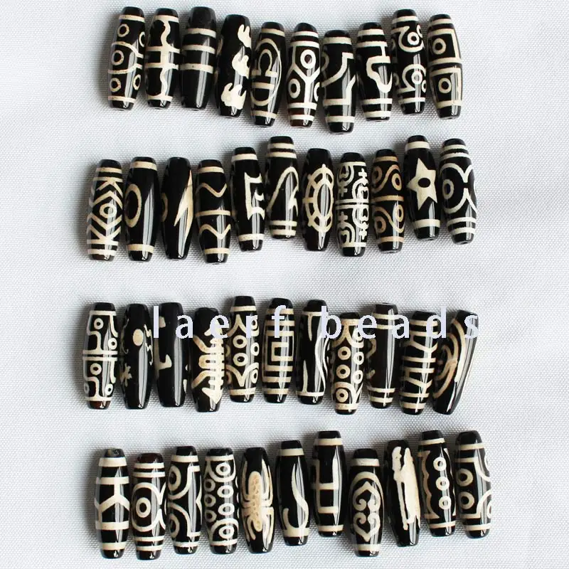 

Бусины из тибетского черного агата, овальной формы, 10 х30 мм, 1 шт.