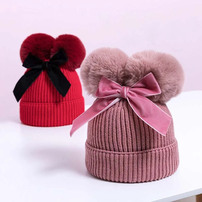 

Милые плотные зимние теплые шапки для детей с двойным помпоном вязаные шапки с бантом облегающая мягкая уличная шапка для девочек и мальчик...
