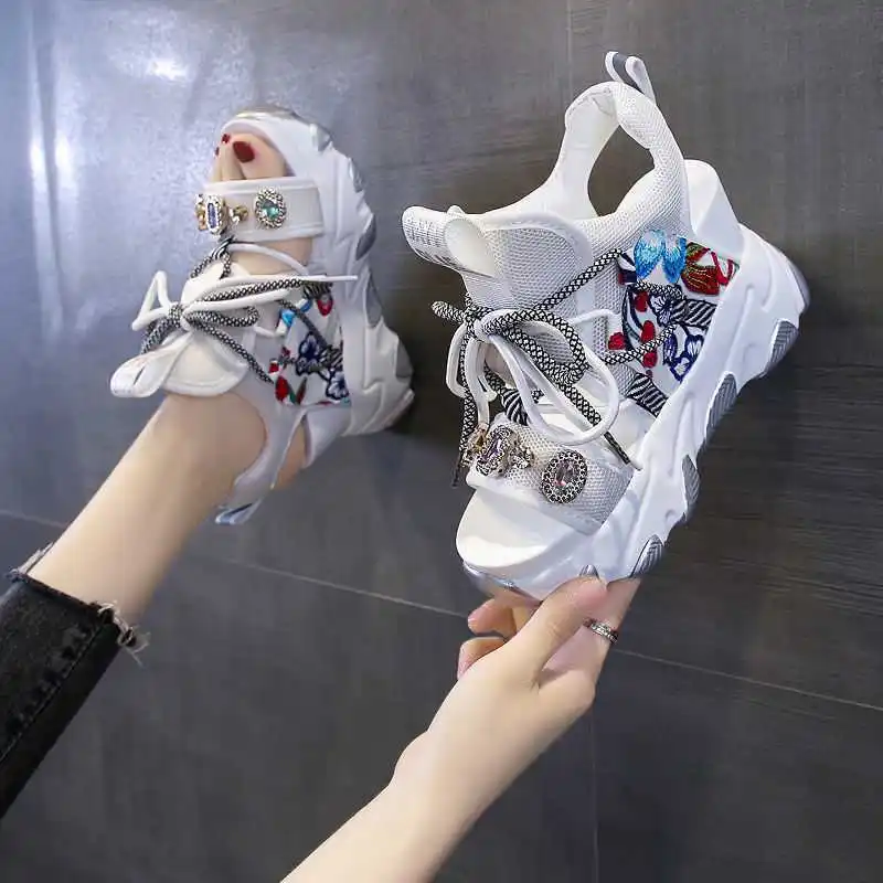 

Slope heel sandals women's summer 2020 new flower thick bottom muffin fairy sports shoes