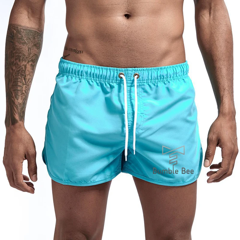 

2021 Men's summer 3-point shorts men's and women's same color sports shorts