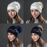 womens winter knitted beanie hat with raccoon fur pom pom warm rhinestone and pearl decoration knit cap beanie for women