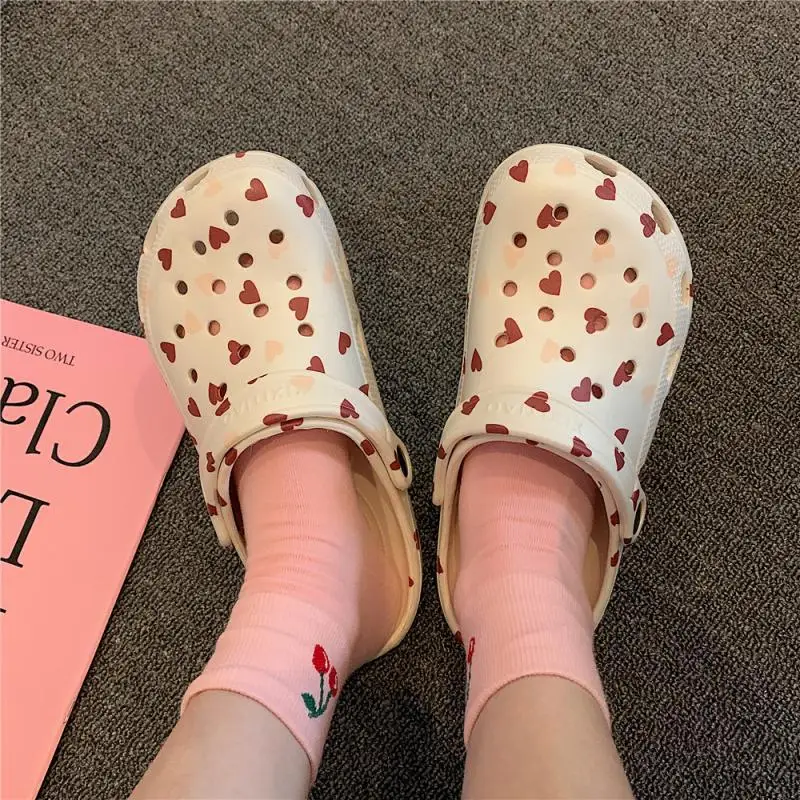 

Summer female Dong Dong cool slippers Korean version personality lovely outside wearing thick bottom fashion Baotou beach cool s