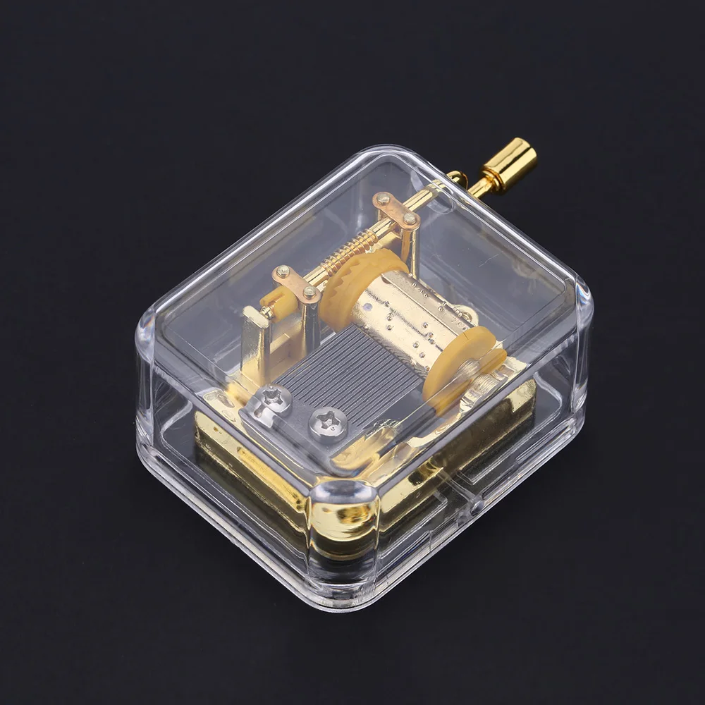 

Unique Musical Box Acrylic Hand Crank Music Box Golden Movement Melody