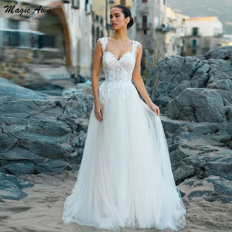 

Magic Awn Charming Beach Wedding Dresses Lace Appliques Illusion Princess Boho A-Line Backless Mariage Gowns Abito Da Sposa