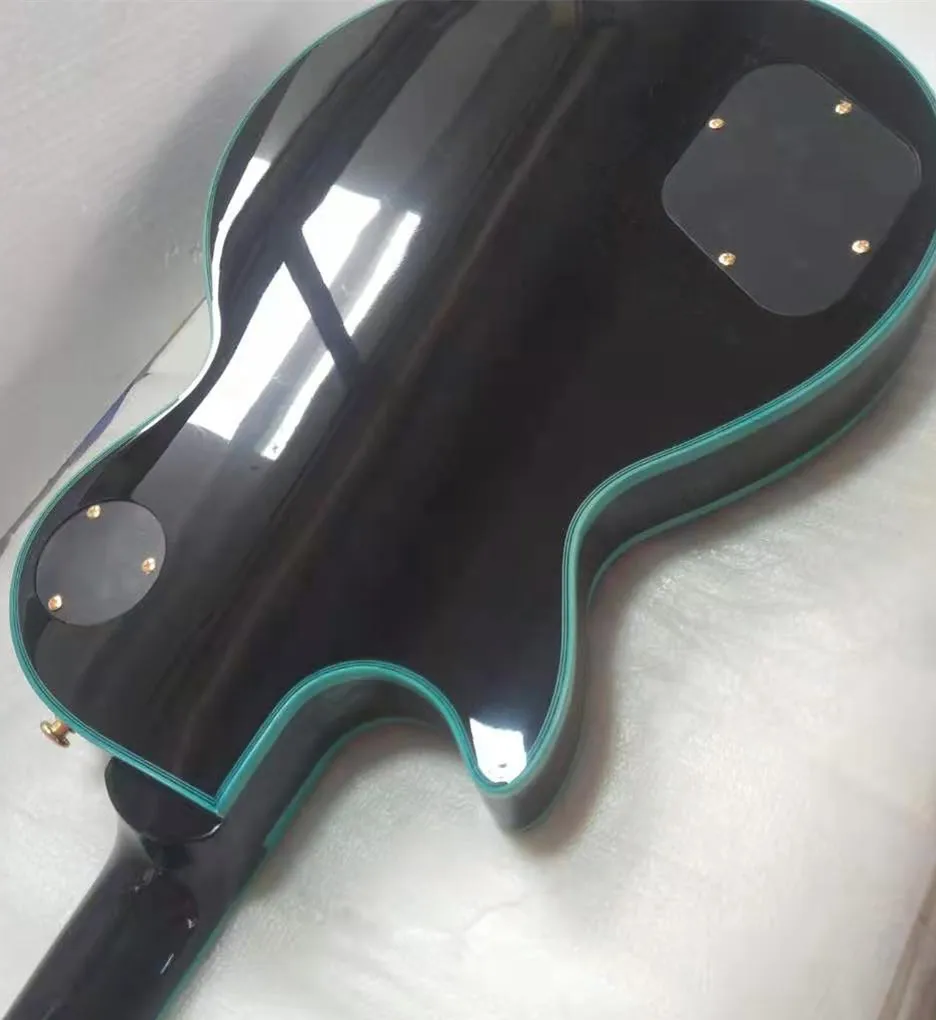 

Guitarra elctrica de alta calidad de cuerpo slido de caoba con parte superior de arce de compresin hardware cromado envo gr