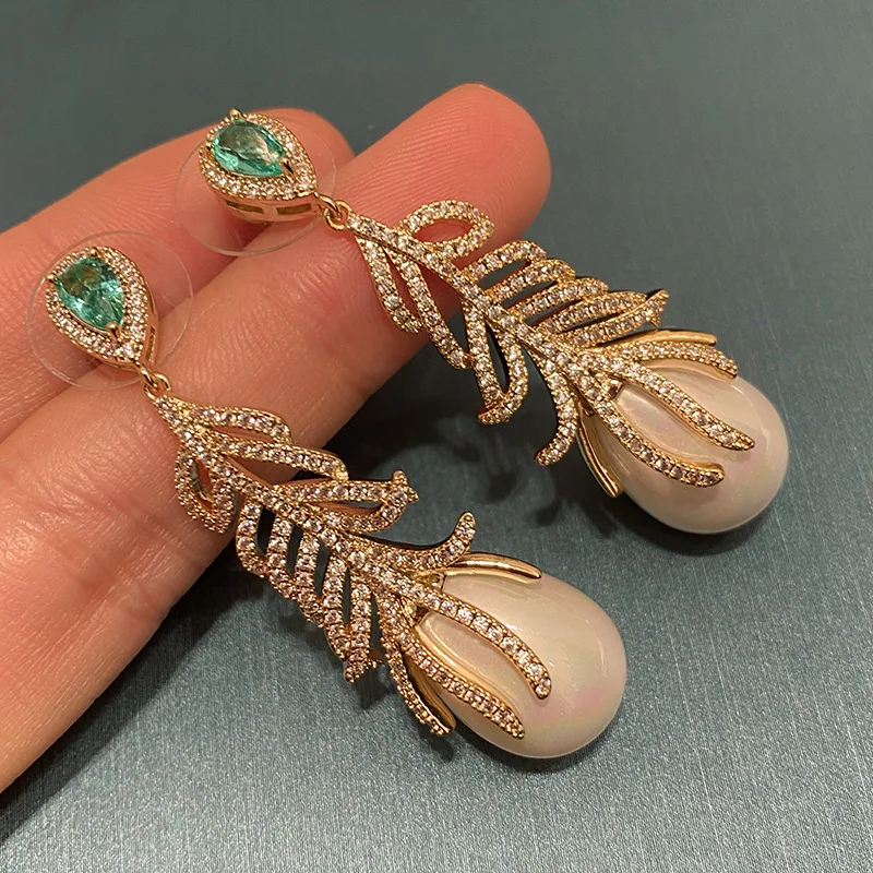 

Vintage Hepburn Baroque Feather Pearl Pendant Earrings Temperament Trendy Net Red Exquisite Temperament Earrings