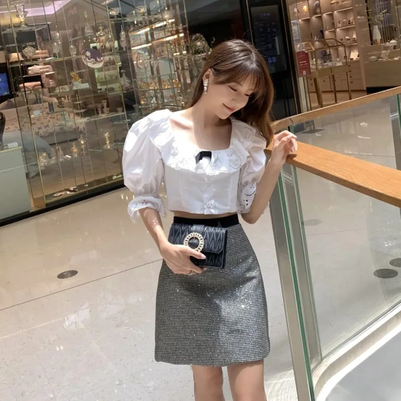 

Runway Designers Tops Women 2021 Elegant Bow White Ruffles Puff Sleeve Cotton Blouses Womens Hollow Out Chemise Femme