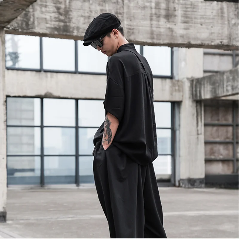 Рубашка Оригинального дизайна темная со свободными плечами с маленькой сумкой