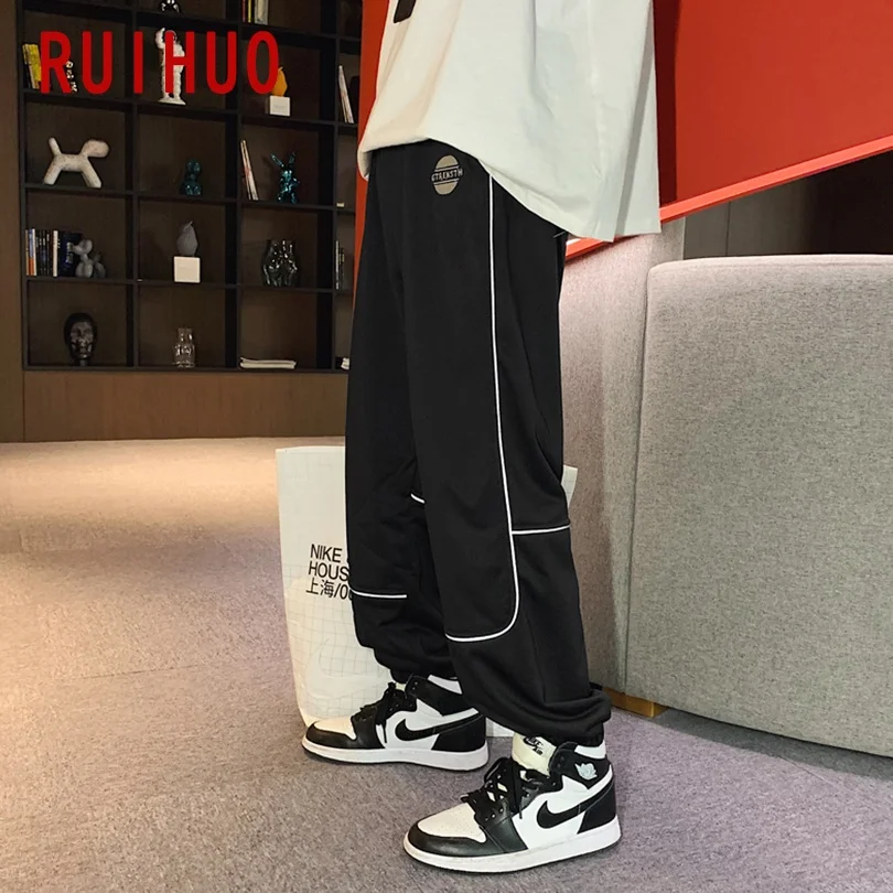 

RUIHUO Hip Hop Streetwear Pants Men Clothing Japanese Fashion Sweatpants Men Korean Fashion Mens Pants M-2XL 2021 New Arrival