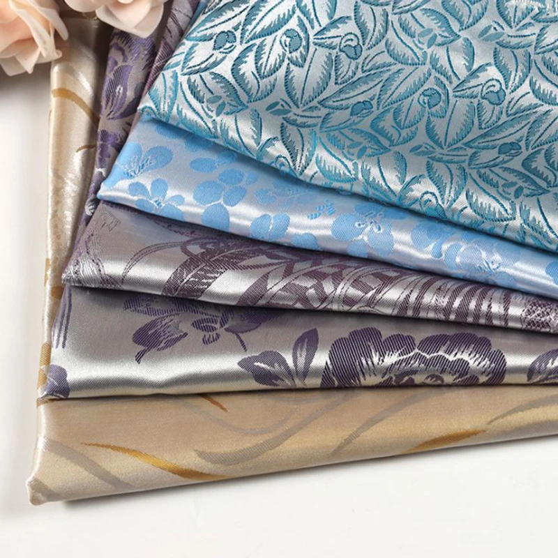 Ткань из жаккардовой парчи с принтом листьев растений для пальто занавесок