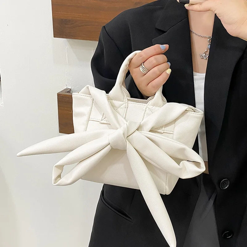 

Girl small bow bag female summer 2021 new trendy fashion messenger crossbody bag shoulder underarm bag portable bucket bag