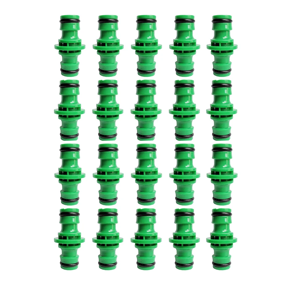Зеленый пластиковый двухсторонний соединитель для садового шланга