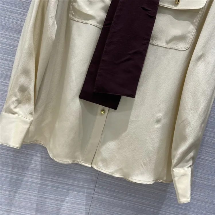 

Eureeky Luxury Brand Silk Lace-up Blouse Women 2021 Early Spring New Retro Shirt Simple Two-pocket Silk Tie Long-sleeved Blouses