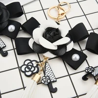 luxury black camellia genuine leather flower keychain letter umbrella pendant car key chain ring pendant for bag