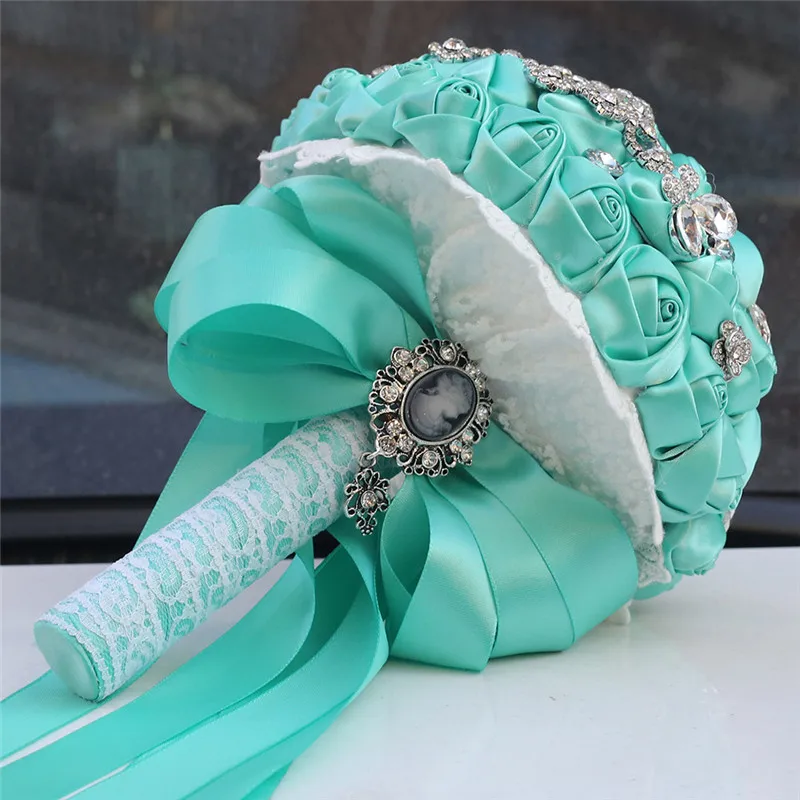 Свадебные букеты с мятно-зеленой розой серебряные бриллиантовые кисточки