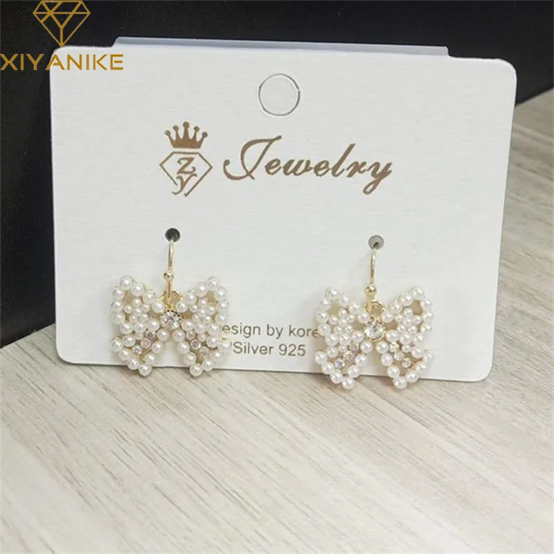 

XIYANIKE 2020 Earrings Pearl White Bowknot Earrings Cute Trendy Statement Stud Earrings For Women Fashion Jewelry Accessories
