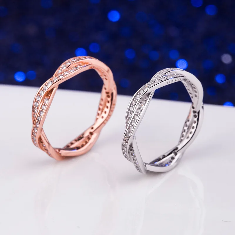 

925 sterling silver European and American fashion rose gold intertwined wheel of fortune ring gives a woman a Merry Christmas